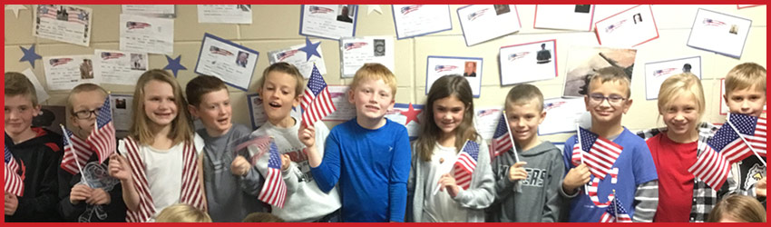 Students holding American flags